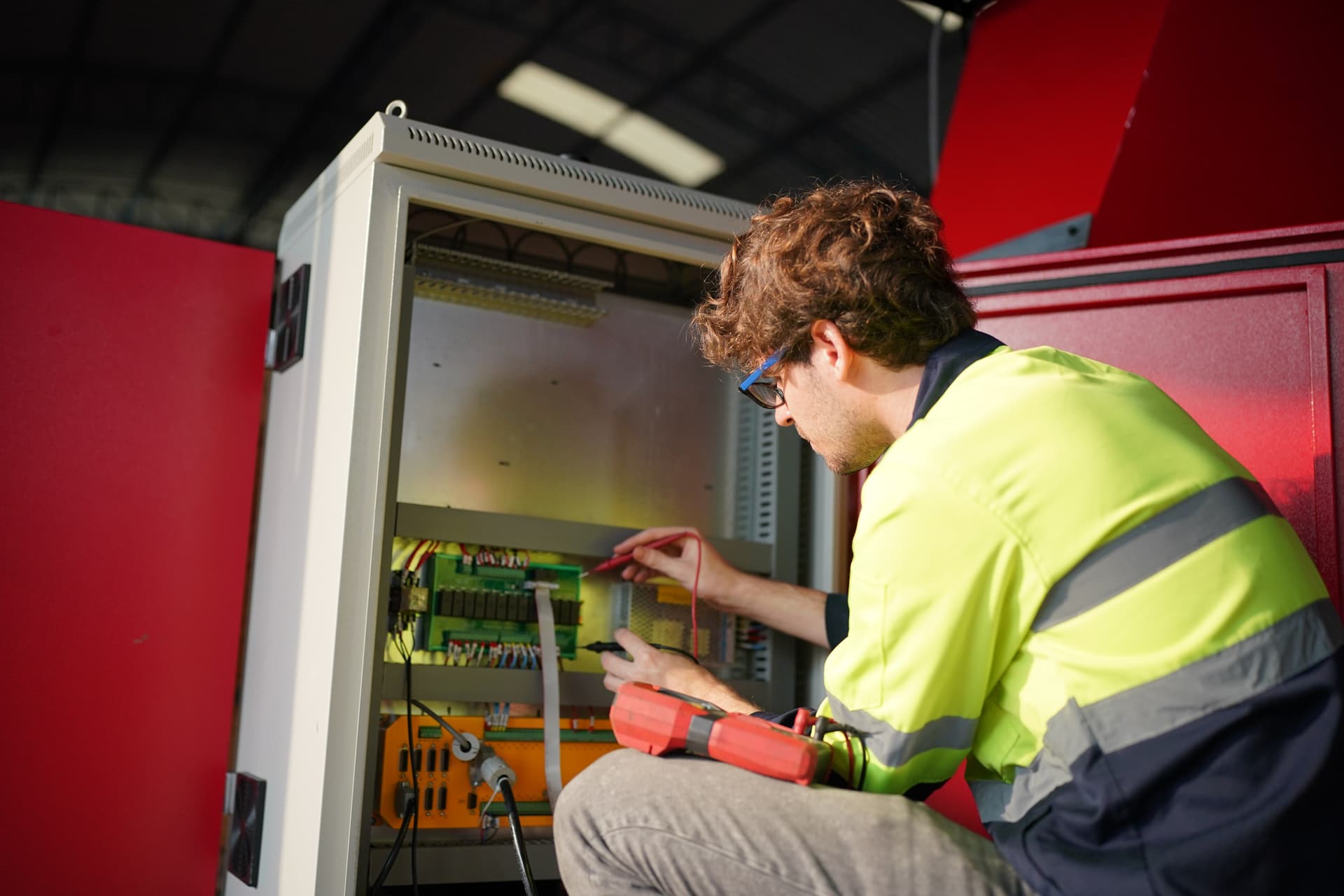 Engineer servicing a fibre laser